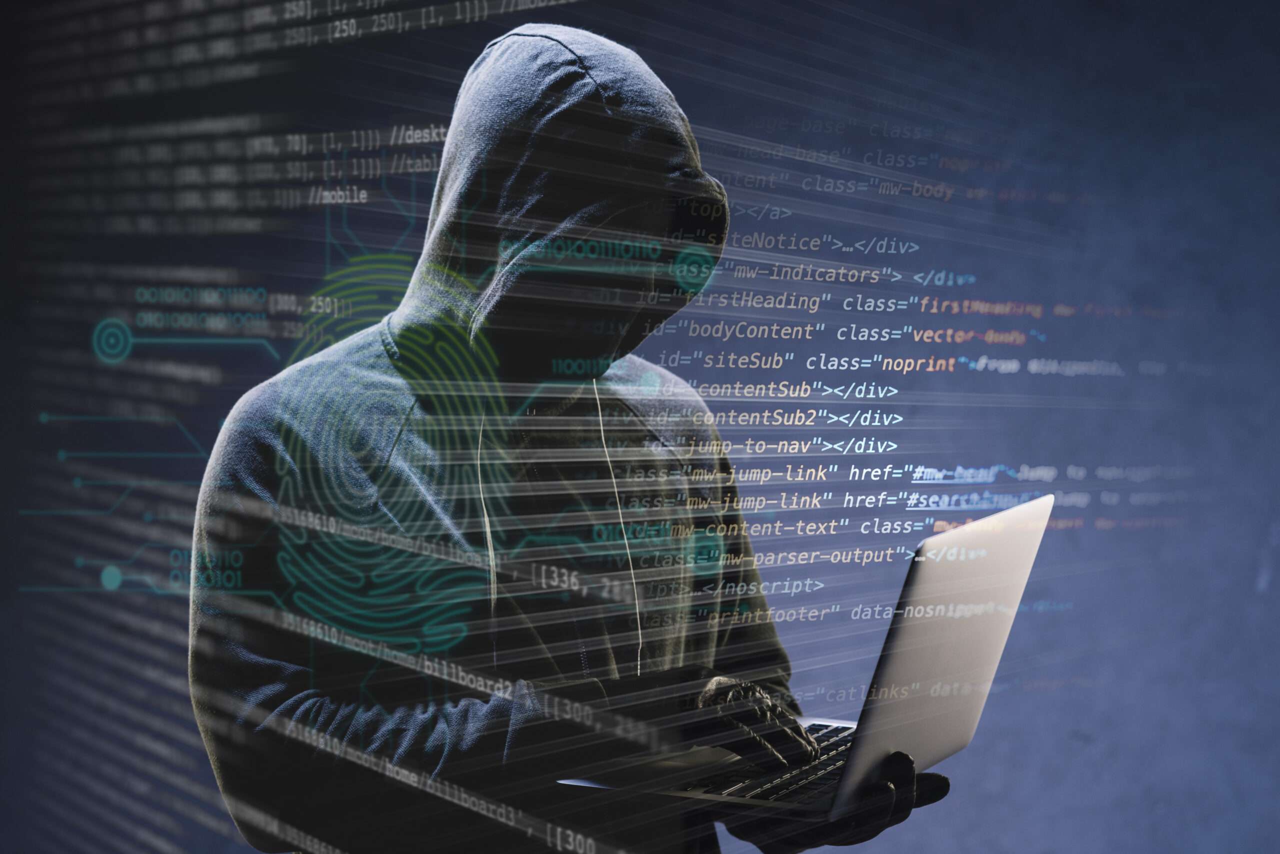 Hacker con una computadora ingresando a un código para hackear